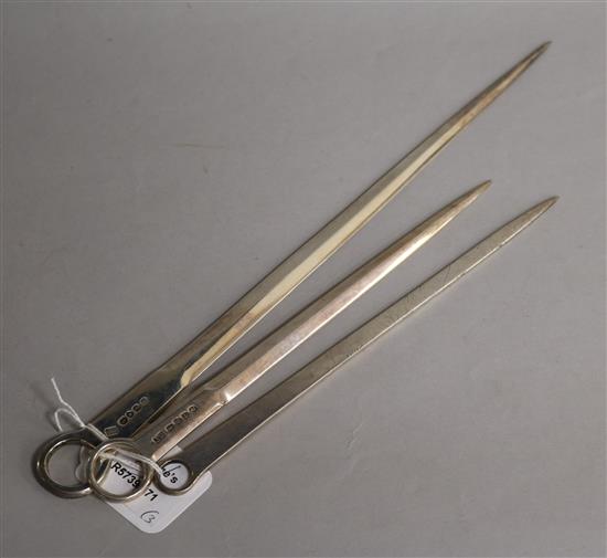 Two George III silver meat skewers and a George IV silver skewer